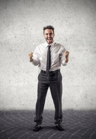 Businessman cheering