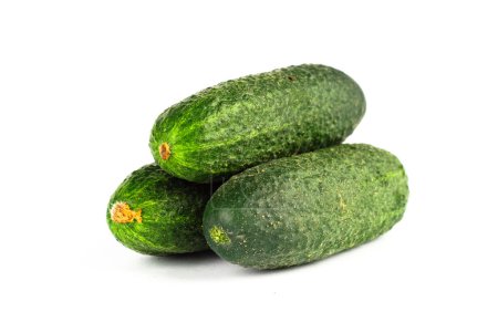 Three cucumbers isolated on white