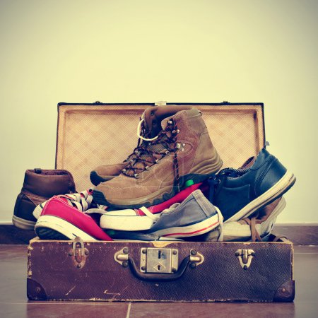 shoes in an old suitcase