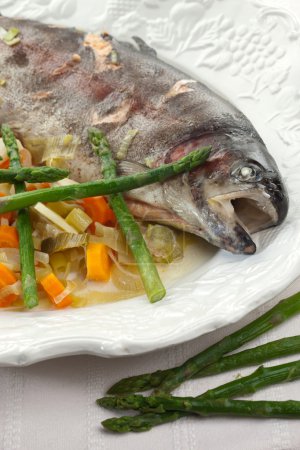 Fish, lake trout with young vegetables