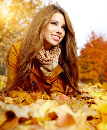 autumn woman on leafs