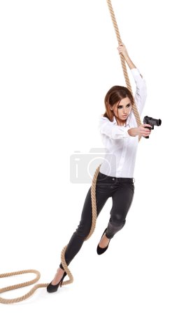 Sexy girl holding a black gun