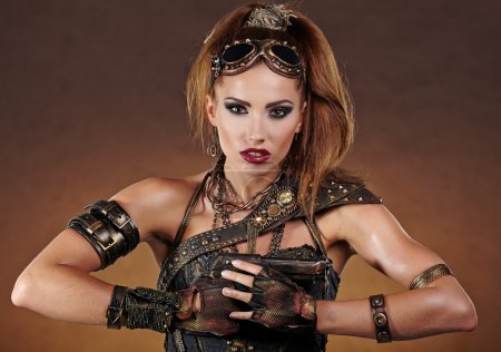 Steampunk woman over gunge background. . Fantasy fashion for cov