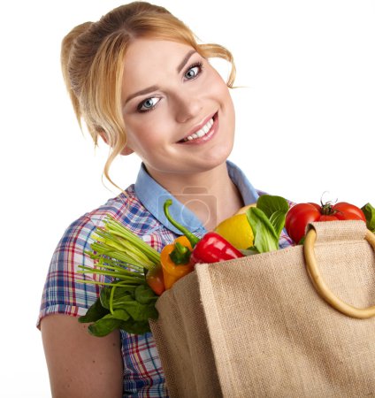 Woman with a grocery shopping bag