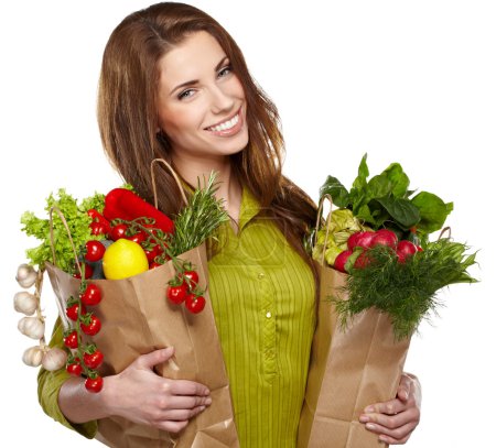 Happy young female holding a shopping bag