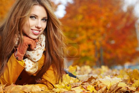 autumn woman on leafs