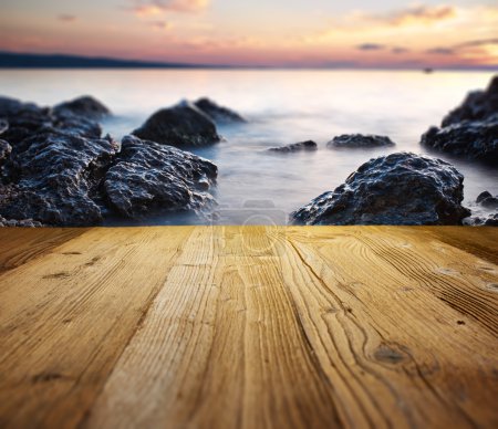 wooden table on the beach 
