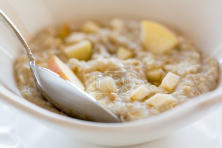 Oatmeal breakfast in modern white bowl