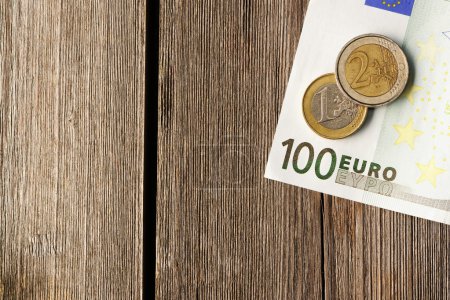 Euro money over wooden background