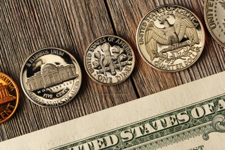US money over wooden background