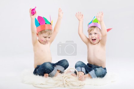 Funny picture of two boys playing Indians