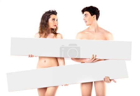 Nude attractive couple with empty boards