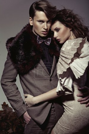 Young couple presenting an autumn fashion