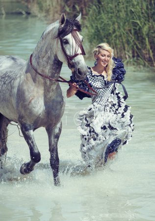 Blonde running with the horse