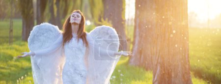 Relaxed woman with the huge wings