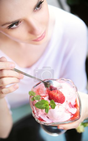 Delicate alluring lady with dessert