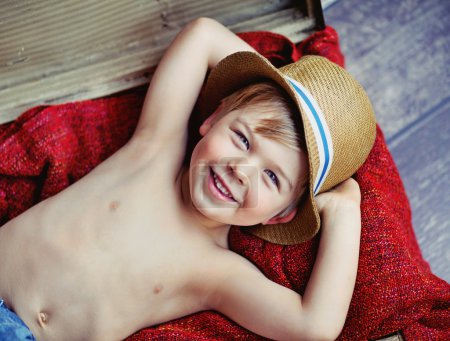 Happy little boy with hat