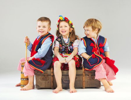 Joyful children wearing national costumes