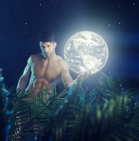 Muscular guy holding the Earth