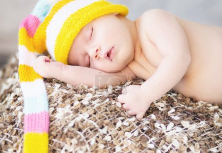 Picture of sleeping baby with woollen cap