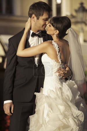 Lovely marriage couple kissing each other