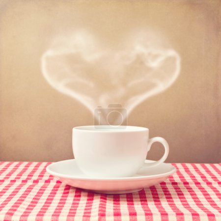 Coffee cup with heart shape steam