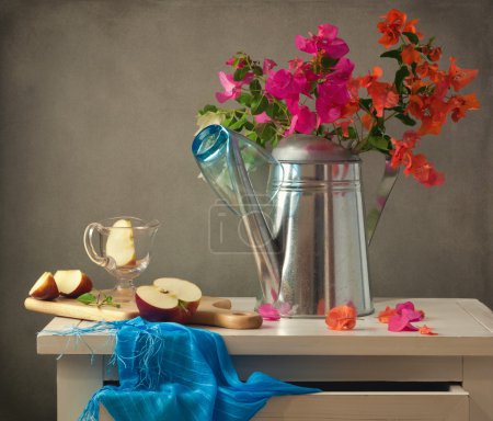 Still life with flowers and apple