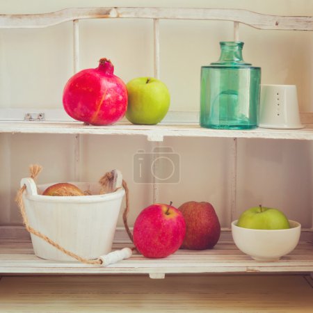 Fruits on kitchen shelf