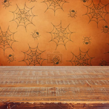 Halloween holiday background with wooden table