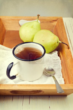 Retro style composition woth tea and pears