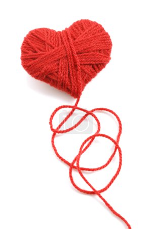 Yarn of wool in heart shape symbol