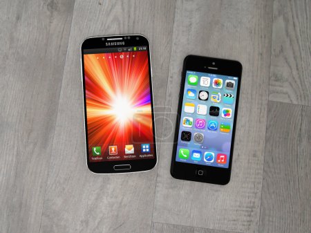 Samsung Galaxy S smartphone and Apple iPhone.