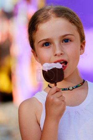 Summer joy - portrait of lovely girl with ice cream