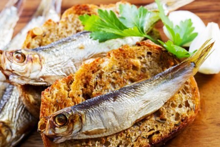 Fish, Spanish tapas - sprat on baked bread