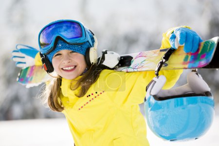 Ski, skier, winter sports - portrait of happy young skier