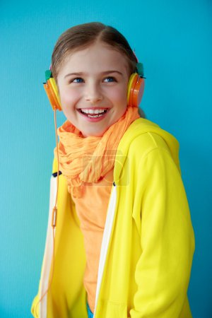 Young girl enjoying music