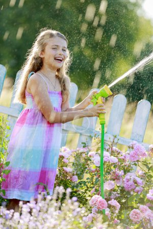Summer fun, watering flowers