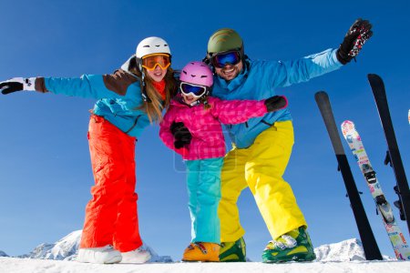 Ski, winter, snow, skiers, sun and fun - family enjoying winter