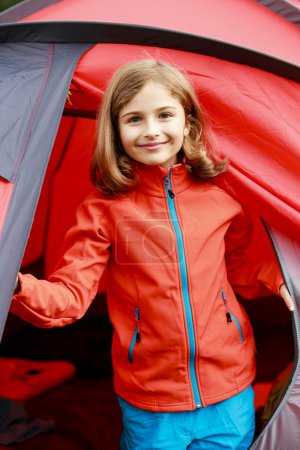 Summer in the tent - young girl on the camping