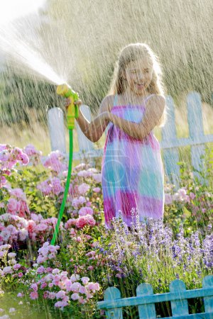 Summer fun, watering flowers