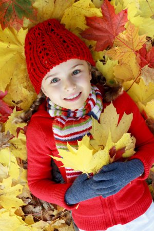 Autumn - lovely girl enjoying autumn
