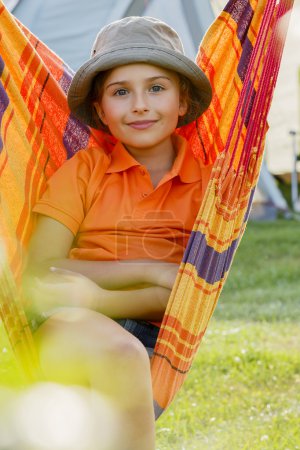 Summer in the tent - young girl on the camping