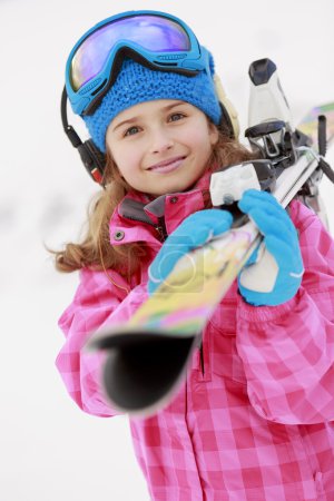 Skiing, skier, winter sports - portrait of happy young skier