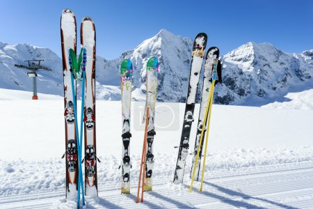 Ski season , mountains and ski equipments on ski run