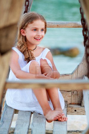 Summer vacation - lovely girl resting on the beach