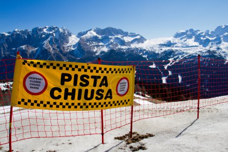 Ski slope in the Dolomites mountain, closed ski run