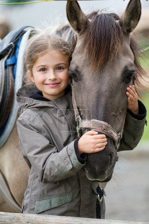 Horse and lovely girl - best friends