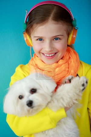 Young girl with cute puppy