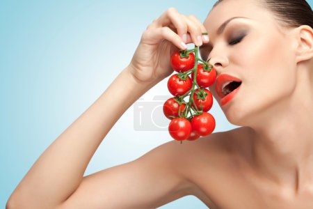 Woman with tomatoes.