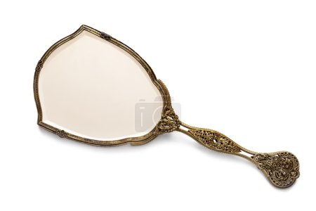 Antique Gilded Hand Mirror over White